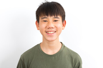 Asian schoolboy teen smile and standing on white background.