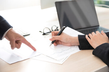 Hands of business people working at office. Businesswoman making a note. People, business and teamwork concept.
