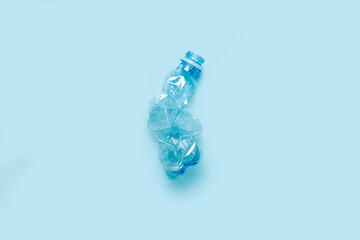 used plastic bottle on a blue background. The concept of using plastic. Environmental problem, global environment. Top view, flat lay