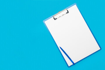 Clipboard with a blank sheet and a pen on a light blue background. Concept questionnaire, form,...