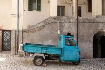 Vintage Blue Vehicle in Italian Village