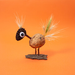 abstract bird made of forest materials, nature craft concept 