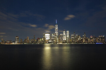 Naklejka na ściany i meble Beautiful night view of Manhattan seen from New Jersey