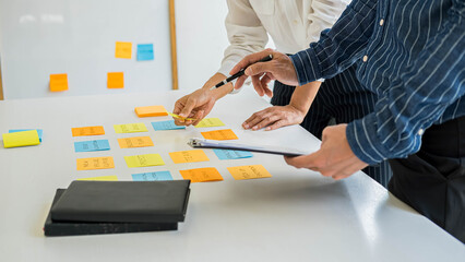 Start up partners are discussing the ideas for new strategy of development.