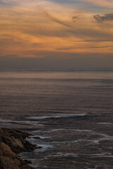 Fototapeta na wymiar Portrait shot of Sunset in Hout Bay from Chapman's Peak Cape Town