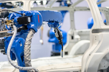 robot arm working in factory