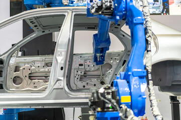robot arm working in car factory