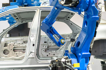 robot arm working in car factory