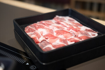 Slice beef main ingredients of traditional hot pot, which is cuisine in asian countries