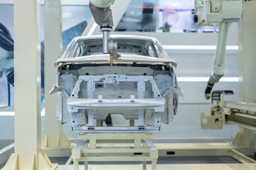 robot arm working in car factory