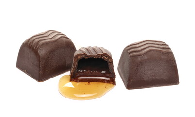 Orange liqueur flavored chocolates isolated on white background 