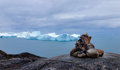 Rocks and iceberg in Ilulissat