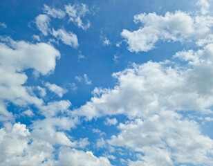 Naklejka na ściany i meble Natural blue sky background with clouds