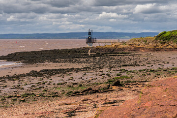 View over Woodhill Bay, the Bristol Channel and the Portishead Point Lighthouse in Portishead,...