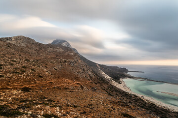 Sunset lights in a cloudy day in Balos Lagoon, Crete, Greece