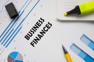 Business concept about BUSINESS FINANCES with inscription on the sheet.