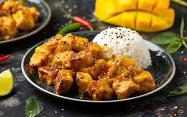 Mango Sticky tofu with jasmine rice and Thai basil