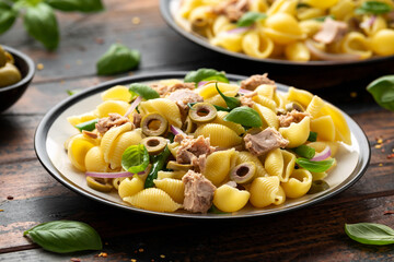 Italian Tuna conchiglie pasta with green beans, olives and red onion. Healthy diet food