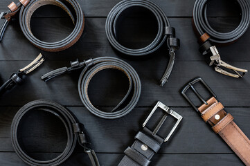 Genuine and Faux leather belts concept, Brown and black leather for denim, linen or corduroy trousers, stylish belt