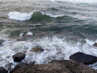 waves crashing on rocks