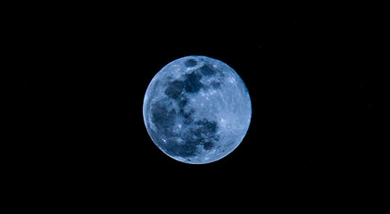 August blue moon in the night sky
