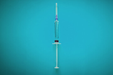 syringe. syringe on blue background