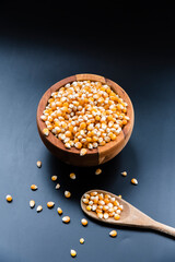Raw corn and popcorn, ready to serve and eat