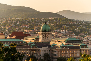 Fototapeta na wymiar Hungary Budapest cityscape about the national gallery which another name is Buda royal palace. Harmas hater mountain on the background and Fishermans bastion on the let side.