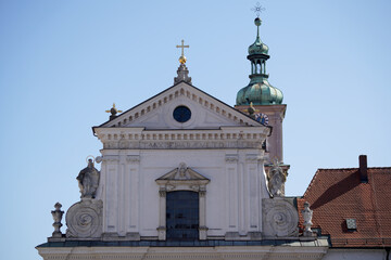 Fototapeta na wymiar Onion dome with onion helmet or onion dome photographed on a church tower as an architectural roof construction in Bavaria