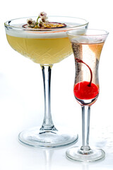 Glass of porn star martini on white background