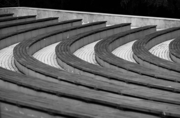 Curved shaped park benches background