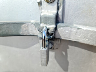 Close uo of a lock at a close metal door