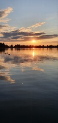 incredible sunset over a large lake.