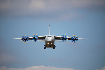 Fototapeta na wymiar Big military transport plane in the sky.