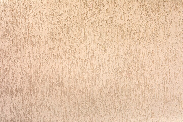 Fototapeta premium Plastered facade wall of the house. Decorative coating.