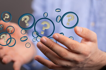 Businessman solving problem with digital question marks 3D rendering