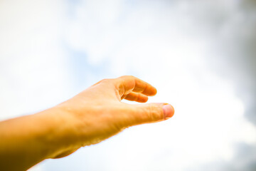 The hand reaches for the sky. We ask for mercy from heaven.