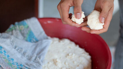 Preparation of round fritters or buñuelos  for frying