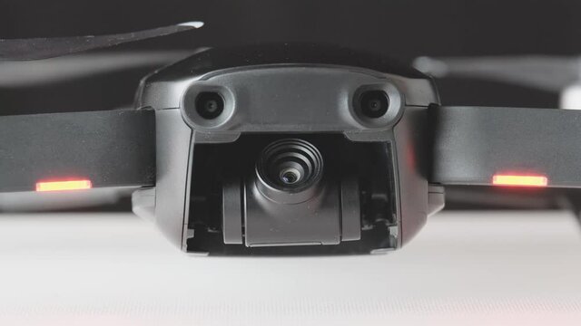 Drone quadcopter initiation camera closeup, futuristic gadget and electronics, professional tool for video and photo 60 fps 4K