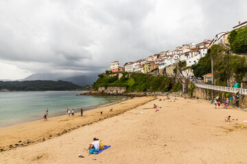 Fototapeta na wymiar Lastres, Spain. The Playa l'Escanu (El Escanu Beach) in this portuary town in Asturias