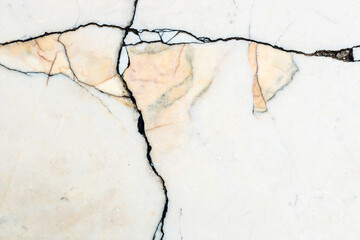 Obraz premium smooth marble wall texture with dark stripes and yellow stone inserts.