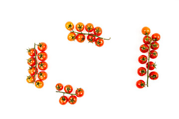 four separate branches of ripe red cherry tomatoes on white background