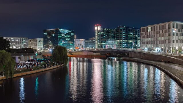 Night Time Lapse of main central station with spree river, Berlin, Germany