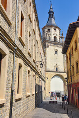 Fototapeta na wymiar Vitoria-Gasteiz, Spain - 21 Aug, 2021: The tower of Santa Maria Cathedral in old town Vitoria Gasteiz