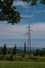 Obraz premium Power line pole, electrical Pylon, blue sky, clouds