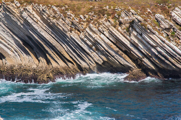 Fototapeta na wymiar rock formation in the ocean