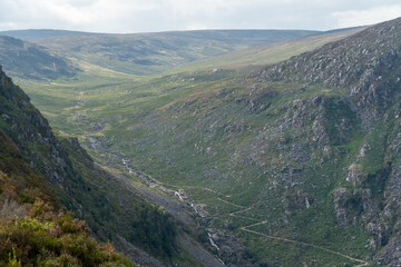 Fototapeta premium Panoramic idyllic view of Glendalough Valley, County Wicklow Upper lake from miners way, Glenealo valley, Wicklow way, County Wicklow, Ireland.
