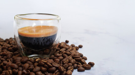 Background Espresso in a cup of coffee and beans Caffeine drink tastes good.