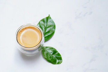 Background Espresso in a cup of coffee and beans Caffeine drink tastes good.
