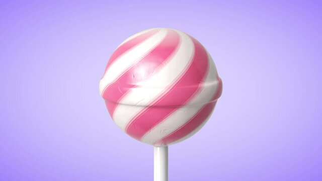 Striped fruit pink and white lollipop on stick rotate on purple background. Seamless loop. Alpha layer included. 3d rendering